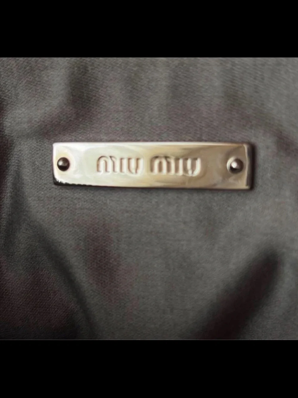 Miu Miu Dusty Pink Quilted Leather Wristlet with Butterfly Charm